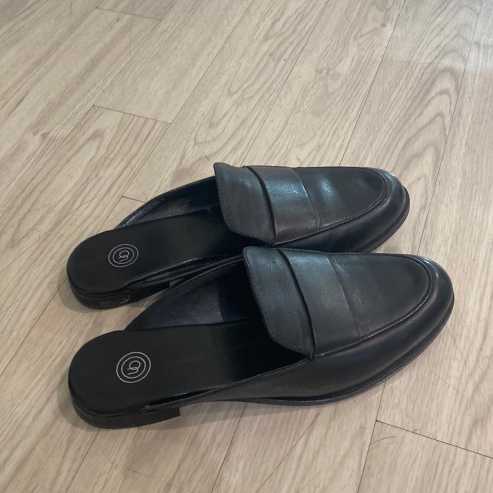 Black leather mule, worn only once! Perfect for business casual attire.